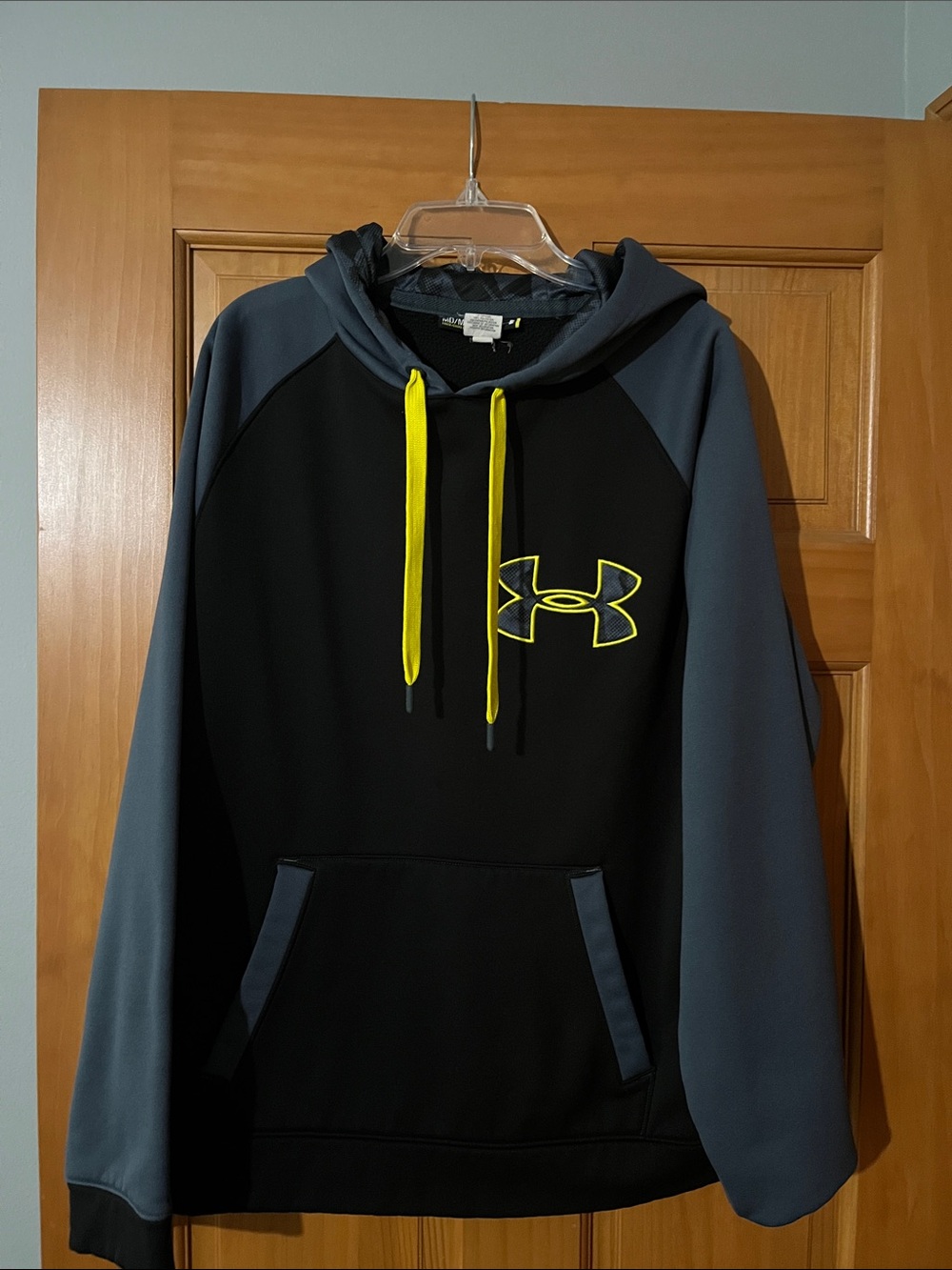 Under Armour Men’s Black Hoodie with Gray Sleeves and Yellow Accents